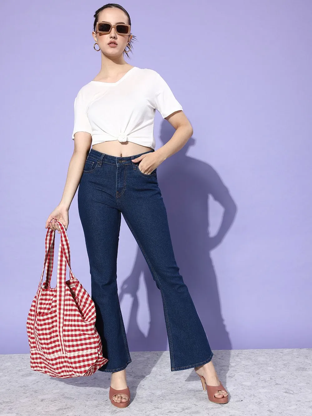 Dark Blue Flared Jeans – Where Retro Elegance Meets Modern Edge