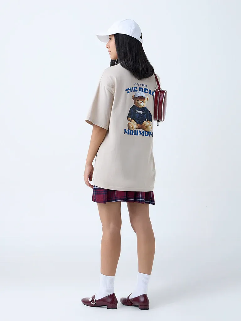 Beige Oversized Graphic T-Shirt for Women – “The Real Minimum” Teddy Print - Image 5